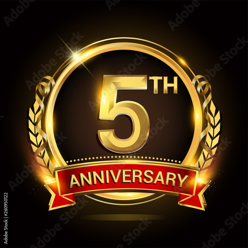 5th golden anniversary logo, with shiny ring and red ribbon, laurel wreath isolated on black background, vector design