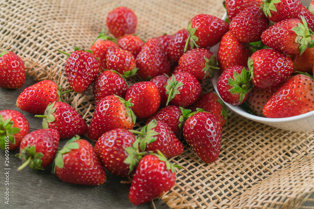 Stack of strawberries on sack cloth. Stack of strawberries on sack cloth.