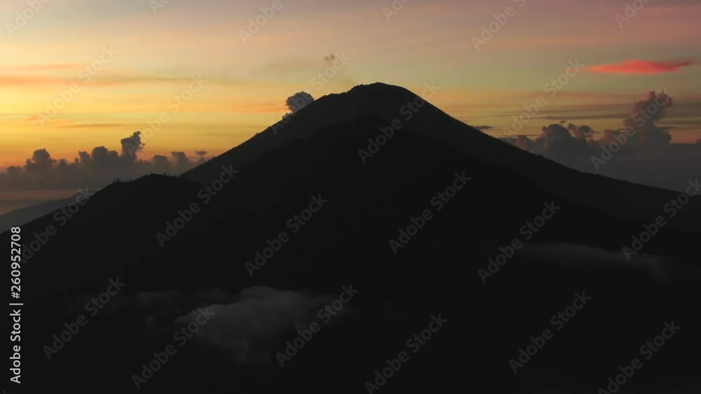 Slow drone aerial view at dawn of mountains and fluffy clouds in Bali, Indonesia. Seq 2. Slow drone aerial view at dawn of mountains and fluffy clouds in Bali, Indonesia. Seq 2.