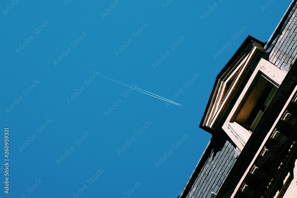 plane in the blue sky