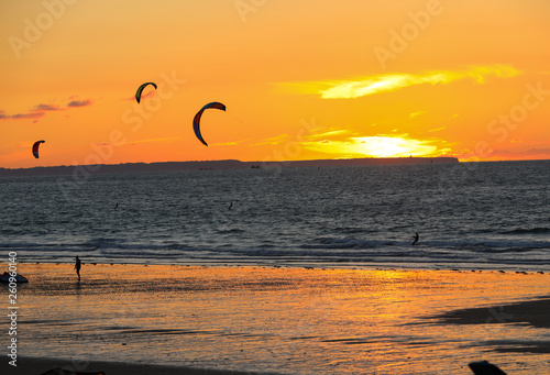  Sunset and Kitesurfers on the beach in Saint Malo,  Brittany, France
