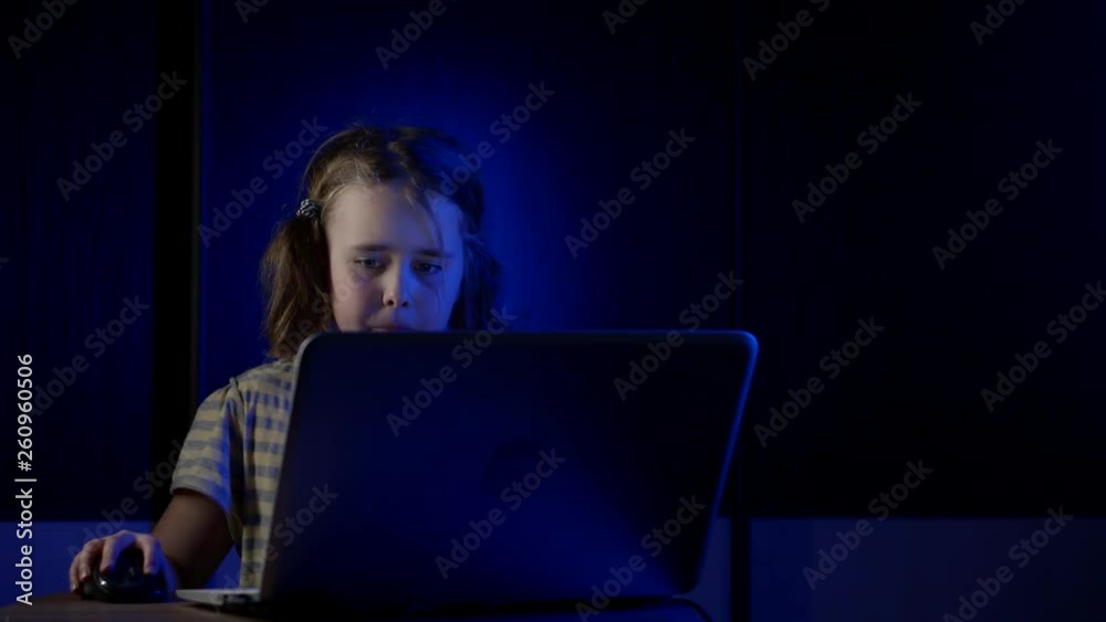 Online a dependent child is sitting watching the social networking the night before a personal computer