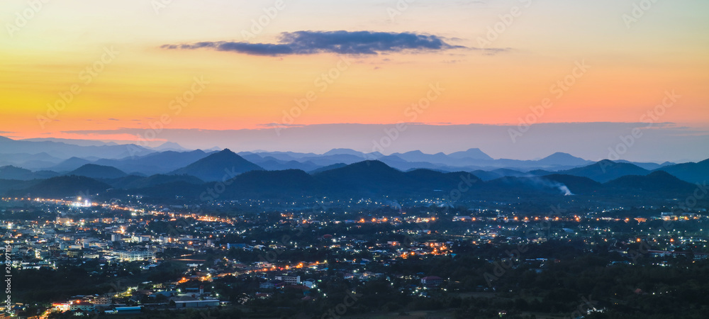 city at night,loei city,thailand,mountain background,sunset over the city