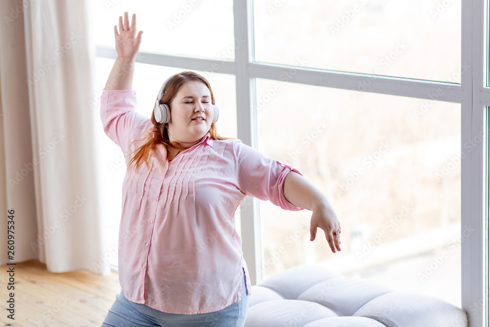 custom made wallpaper toronto digitalHappy positive woman dancing to her favourite music
