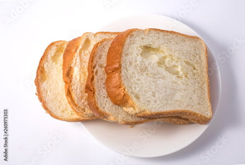 Slice of toasted bread on white background