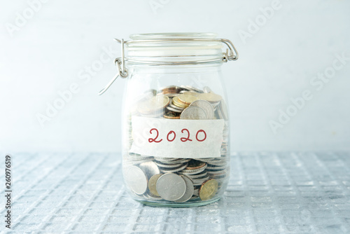 Saving jar with coins