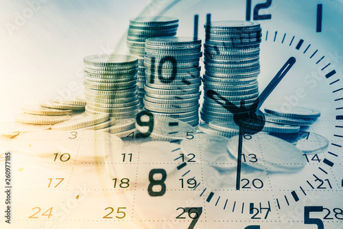 double exposure of rows of coins with clock and calendar for business and finance background