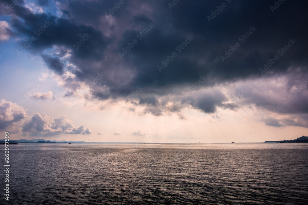 Sea with the rain cloud background in morning