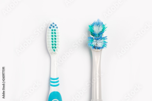 The old toothbrush and new toothbrush isolated on a white background.