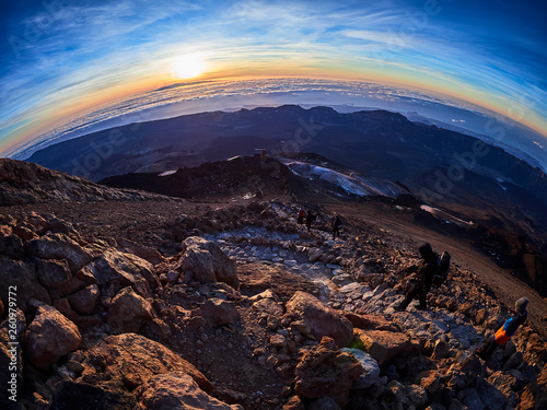 Beautiful view from the top of the Teide volcano peak, Pico del Teide, with tourists at sunrise in Tenerife, Spain © thecriss