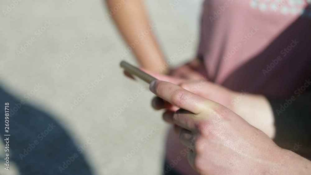 Closeup shot of male hands using smartphone. Cropped shot of young man holding modern phone. Technology concept Closeup shot of male hands using smartphone. Cropped shot of young man holding modern phone. Technology concept