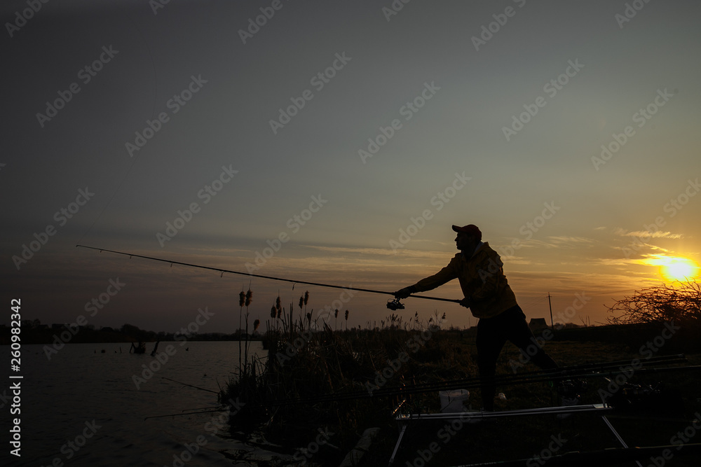 a fisherman against the background of a fallen sky a fisherman against the background of a fallen sky