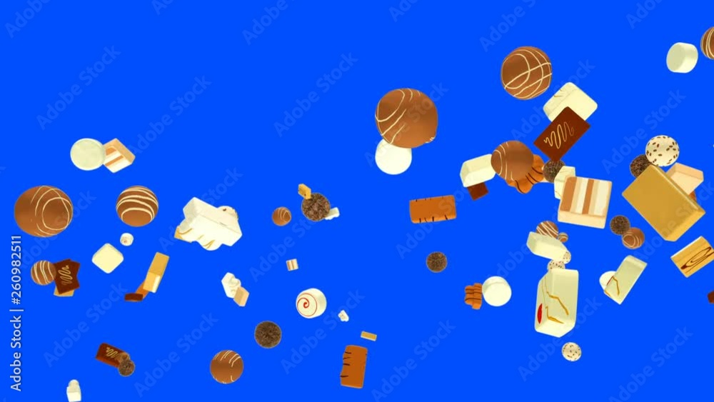 Sweet bonbons flying in slow motion against Blue Screen