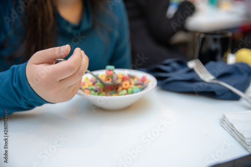 Teen Girl Eating Junk Cereal 