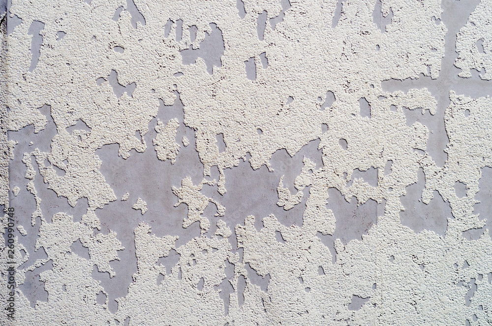 shabby white paint on the wall. Background, texture. shabby white paint on the wall. Background, texture.