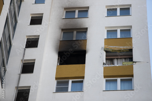 Front and windows of a condominium after an explosion and fire in its apartment.