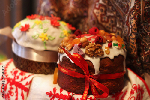still life with two festive Easter cakes on the background of a scarf. Light Easter holiday, traditional food. Christ is risen