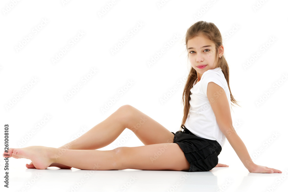 The gymnast prepares to perform the exercise. The gymnast prepares to perform the exercise.