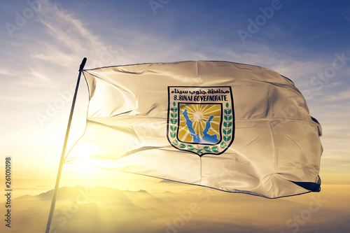 South Sinai governorate of Egypt flag waving on the top sunrise mist fog photo