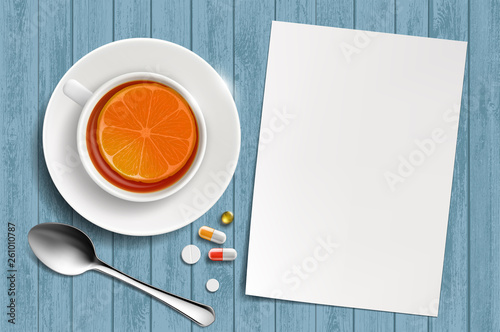 Cup of tea with lemon and a white blank sheet