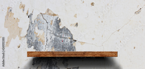 Wood shelf on brick wall. Polished cement floor. texture background. furniture.photo