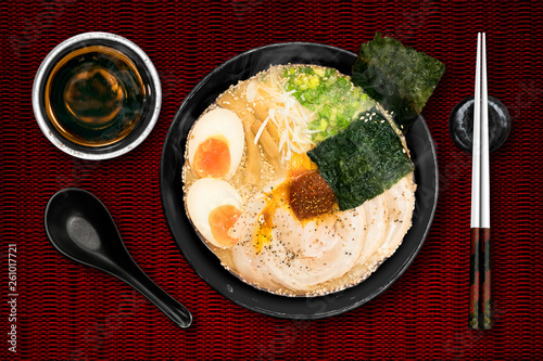 Ramen are Japanese noodles. They consist of wheat noodles served in a pork broth. often flavored with miso, uses toppings such as sliced pork (chasyu), dried seaweed and bamboo shoots ( menma). photo