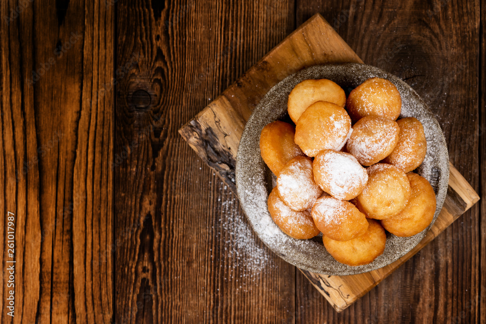 Baursak - traditional Kazakh (Asia) food \ national bread in plate on wooden background, top view