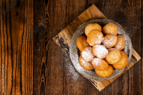 Obraz na płótnie Baursak - traditional Kazakh (Asia) food \ national bread in plate on wooden background, top view w salonie