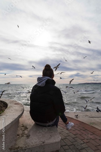 .depressed young girl by the sea