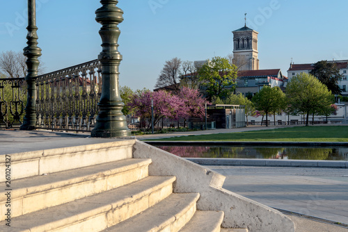 Fototapeta Naklejka Na Ścianę i Meble -  Champ de Mars esplanade view with the Cathedral Saint-Apollinaire in the background in Valence. France 2019.