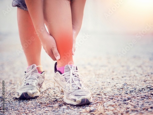 Pain in the ankle and leg area , Caused by exercise or running. © Tanapat Lek,jew