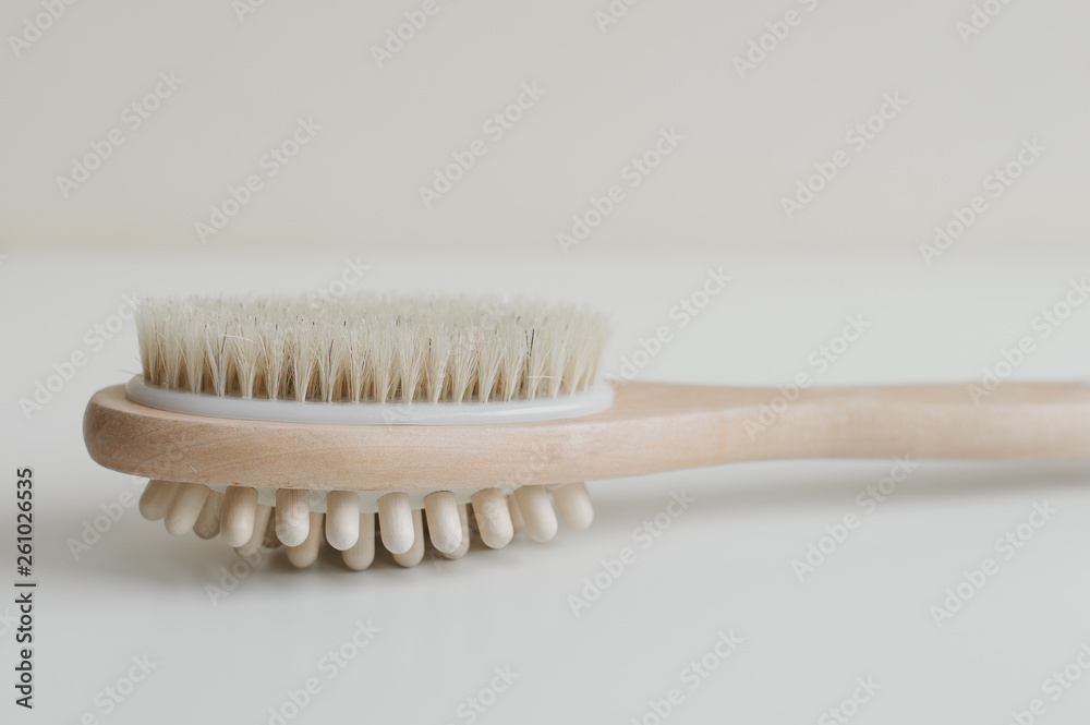 Anti cellulite brush for body massage. Wooden bath brush for body peeling