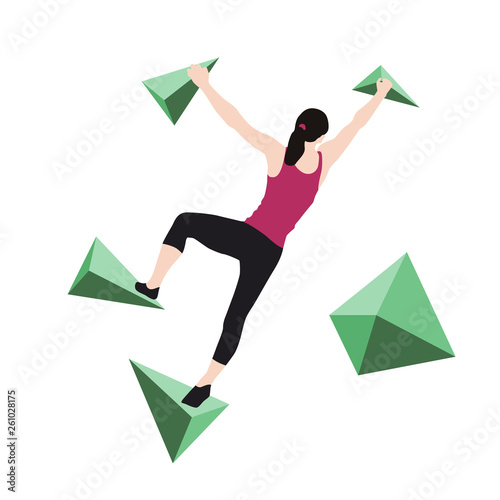 Woman climbs climbing wall