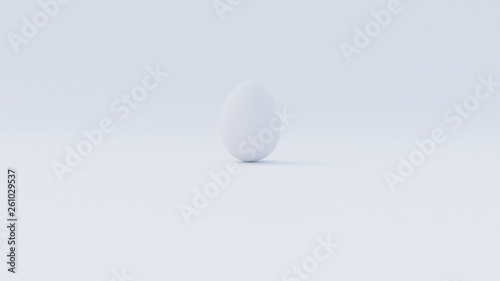 Weisses Osterei Ei versteckt auf weissem Hintergrund 