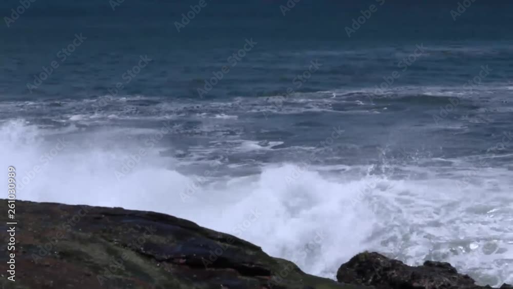 waves crashing on the shore of the beach waves crashing on the shore of the beach