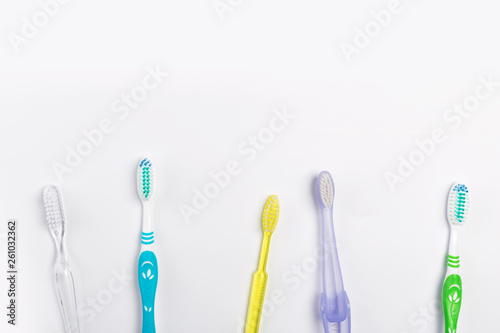 New different  toothbrushes on a white background