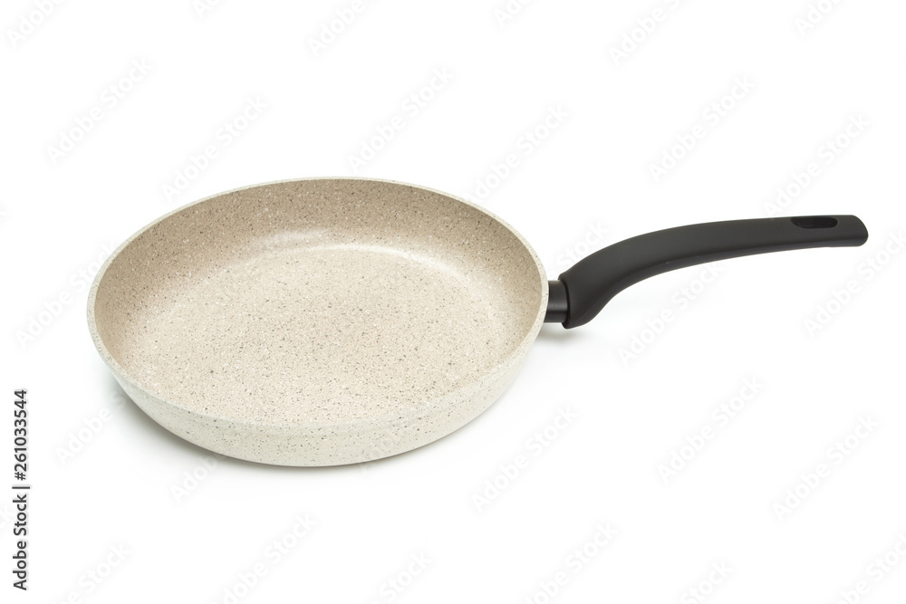 Photo of a bright ceramic pan with a black handle, isolated on a white background. Photo of a bright ceramic pan with a black handle, isolated on a white background.
