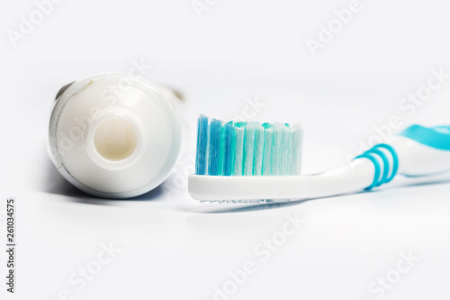 Flat lay composition with toothbrushes on white background.