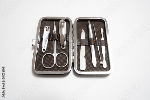 Nail clipper set, plastic and silver, isolated in white background