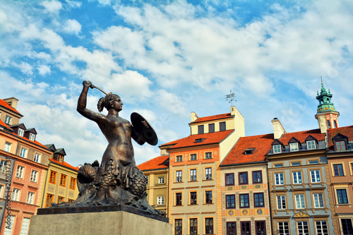 Scenic cityscape with the Old Town Market Square (Rynek Starego Miasta) and the Warsaw Mermaid , symbol of the city.