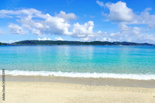 Tropical paradise of white sand  turquoise sea and deep blue sunny sky at Zamami  Okinawa  Japan