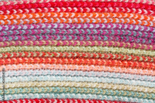 Multicolored Knitwear Sweater Fabric Texture. Bright saturated background