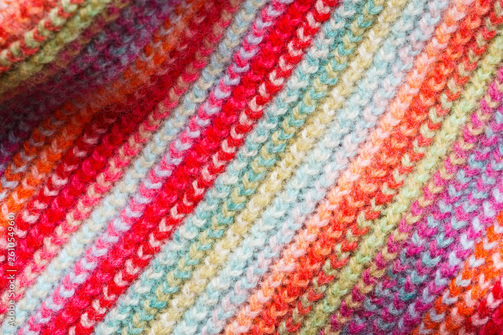 Multicolored Knitwear Sweater Fabric Texture. Bright saturated background