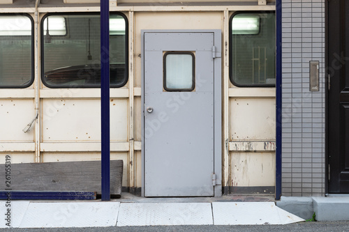 sidewalk by street wall   door