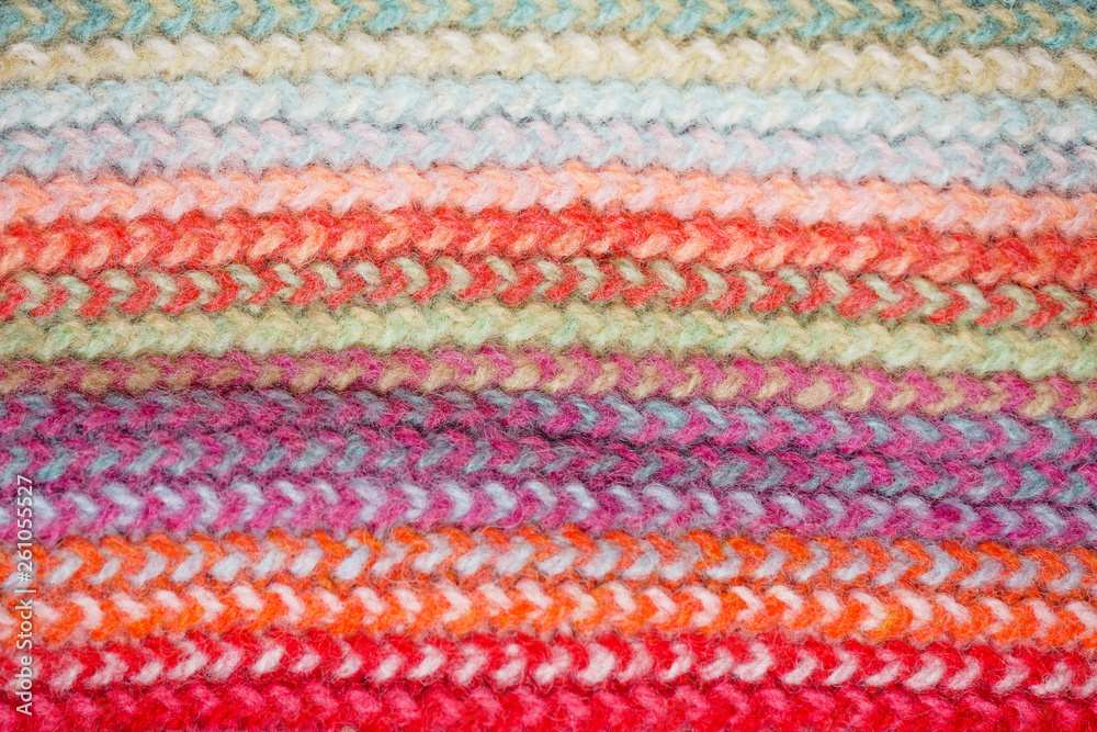 Multicolored Knitwear Sweater Fabric Texture. Bright saturated background