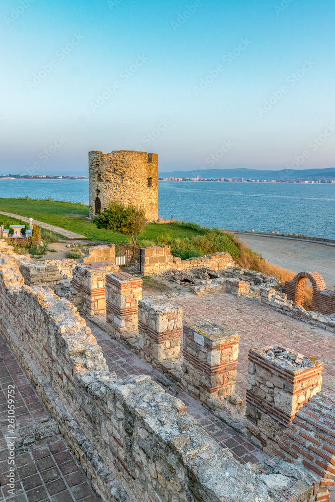 Basilica of the Holy Mother of God Eleusa and the Tower at sunrise in Nessebar ancient city. Nesebar, Nesebr is a UNESCO World Heritage Site. The ruins of an old church in Nessebar, Bulgaria