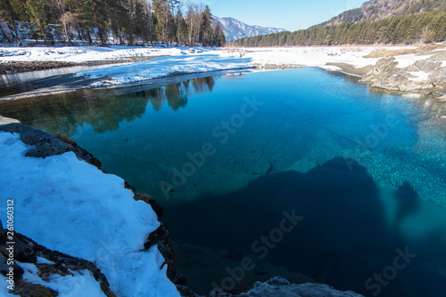 Aerial view of winter blue lakes in Altai mountains © olinchuk