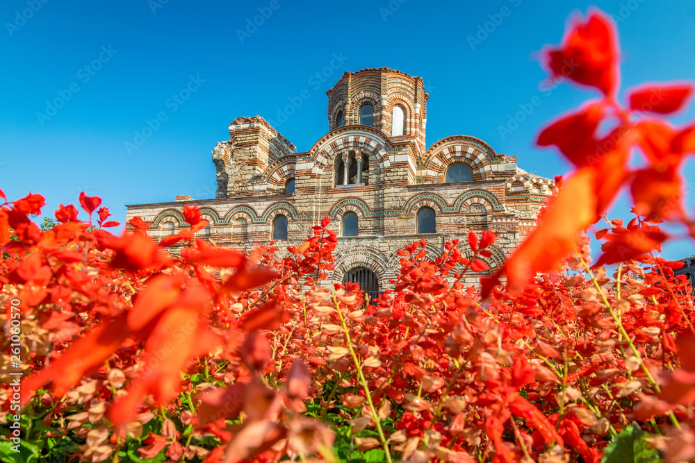 Church of Christ Pantocrator in Nessebar ancient city. Nesebar, Nesebr is a UNESCO World Heritage Site. An ancient Byzantine architecture church in Nessebar, Bulgaria on a sunny day with blue sky - obrazy, fototapety, plakaty 