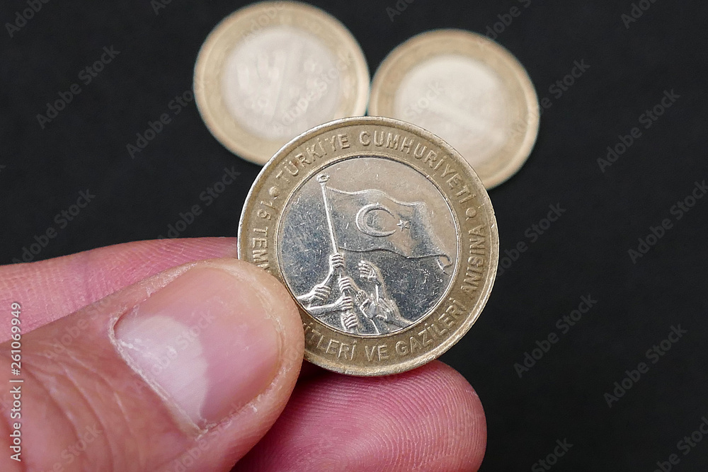 republic of turkey in the hands of a human, coin issued for July 15,close up republic of turkey in the hands of a human, coin issued for July 15,close up