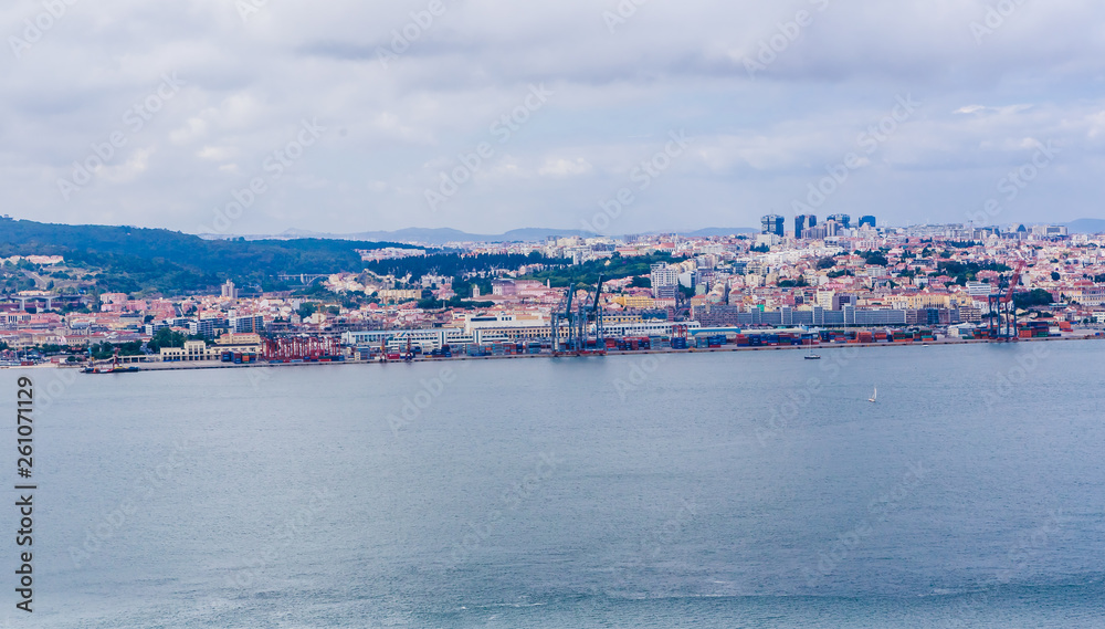 Panoramic view from Almada across the Tagus River at Lisbon, Portugal